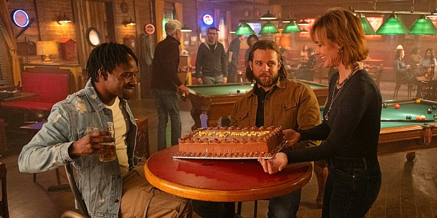 Sharon presenting Bode and Freddie with a cake in the Season 2 finale of Fire Country