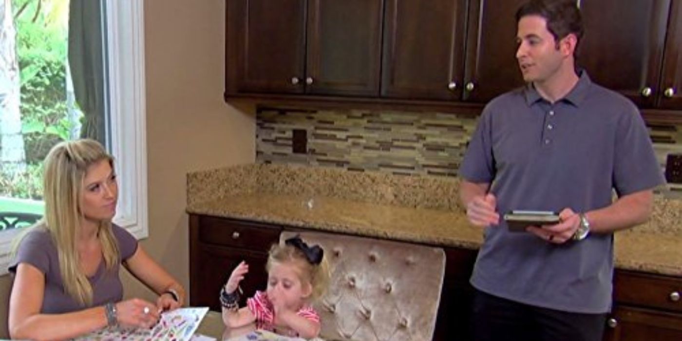 Tarek and Christina in the kitchen with their daughter on 'Flip or Flop.'