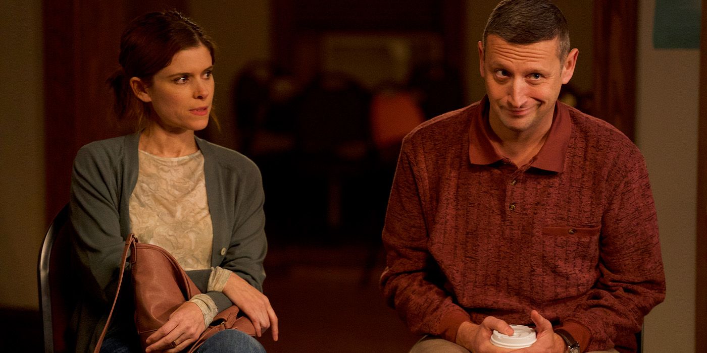 As they sit, Kate Mara looks at a smirking Tim Robinson with exasperation