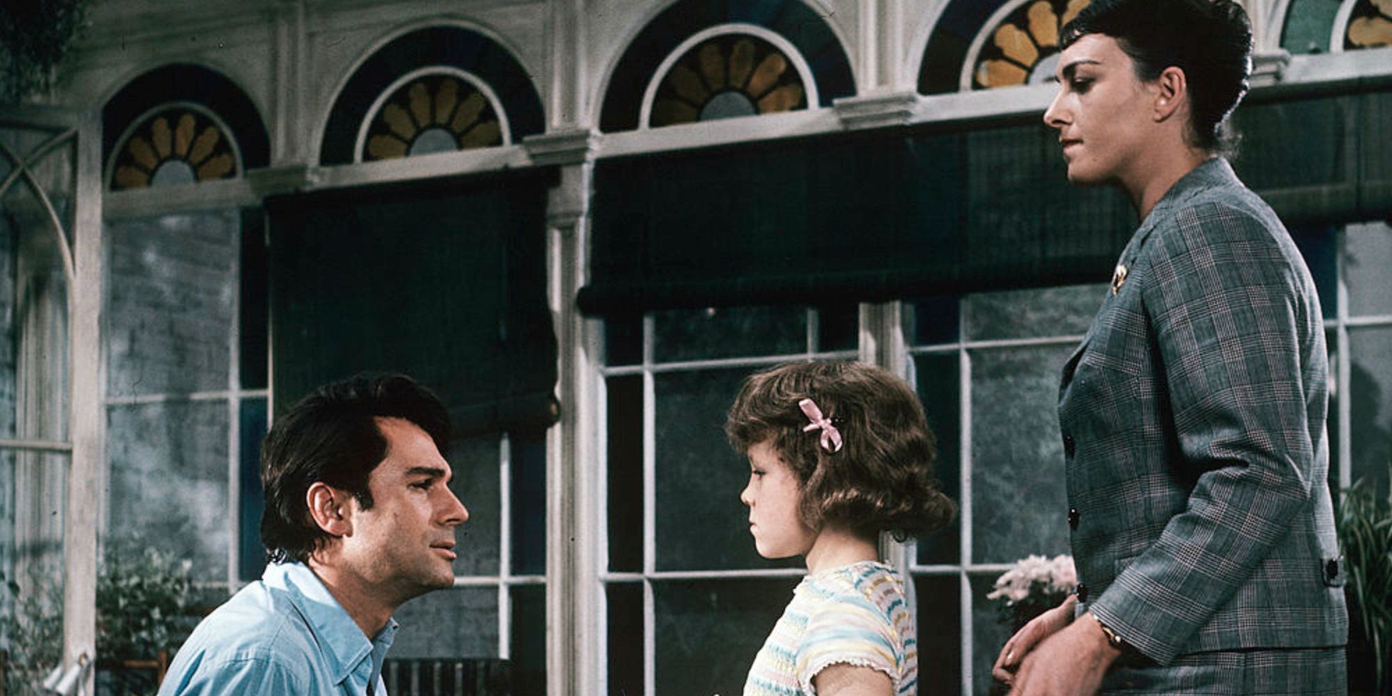 George Maharis kneeling down in front of Kim Burfield while Barbara Jefford stands behind her in Journey to the Unknown