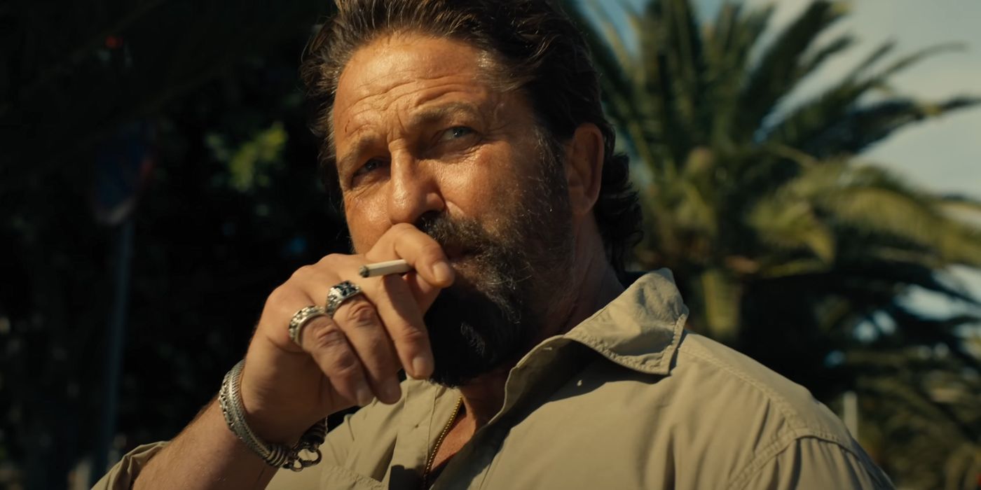 Gerard Butler smoking a cigarette in Den of Thieves: Pantera.