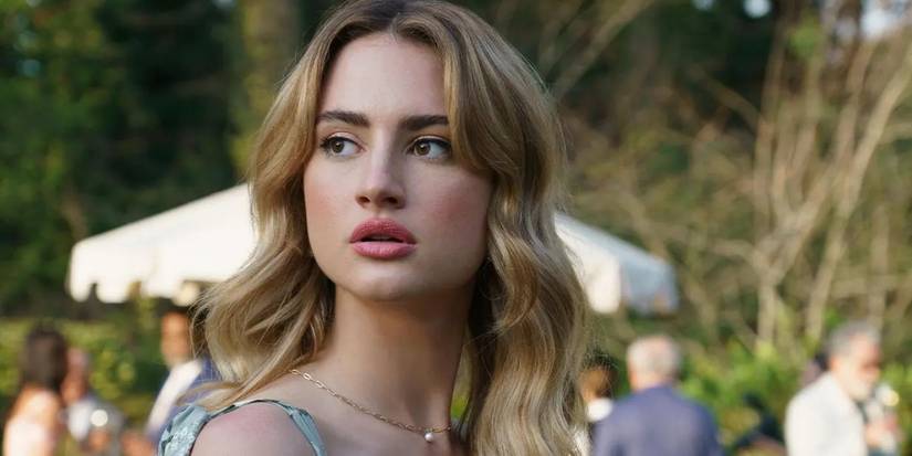 Grace Van Patten looking at Jackson White who is off camera at an engagement party in 'Tell Me Lies' Season 1.
