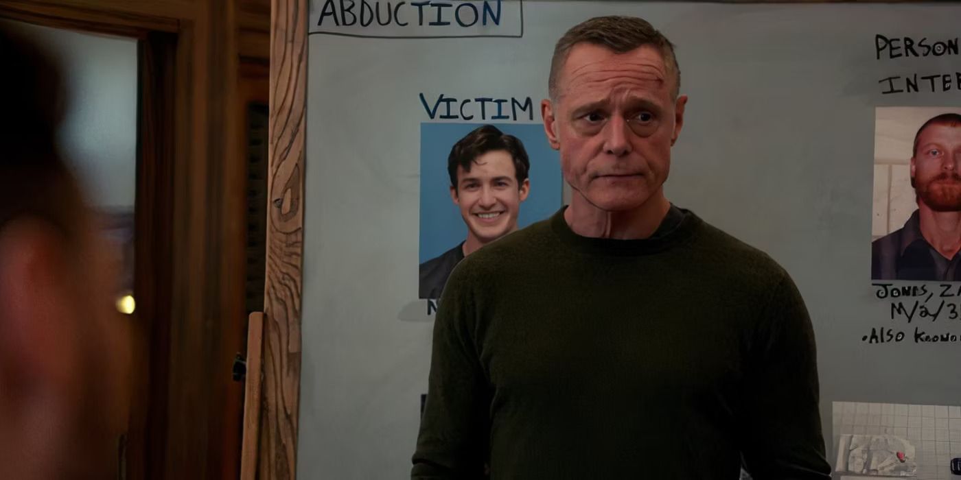 Jason Beghe as Hank Voight stands in front of a case board in Chicago P.D.