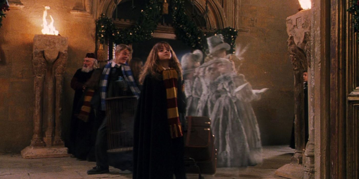 Emma Watson as Hermione Granger in with Derek Hough behind her in &lsquo;Harry Potter and the Sorcerer&rsquo;s Stone&rsquo; (2001)