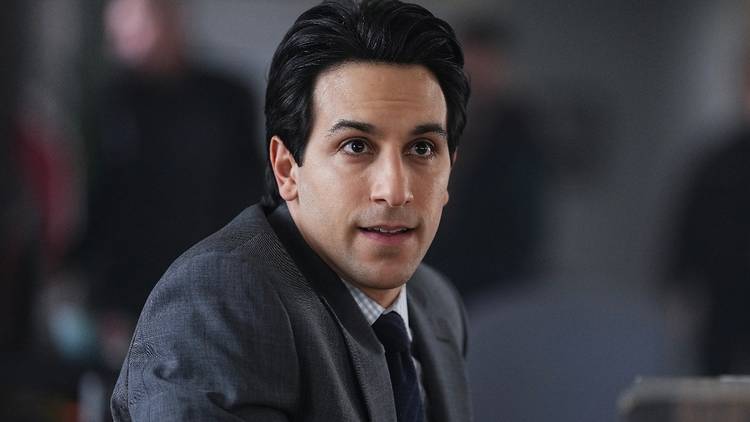 Deniz Akdeniz turns in his seat in High Potential