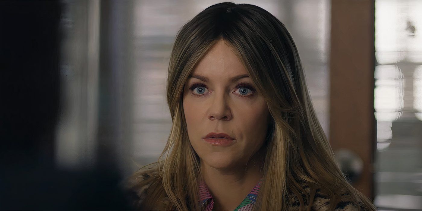 Kaitlin Olson sitting in a police station in High Potential