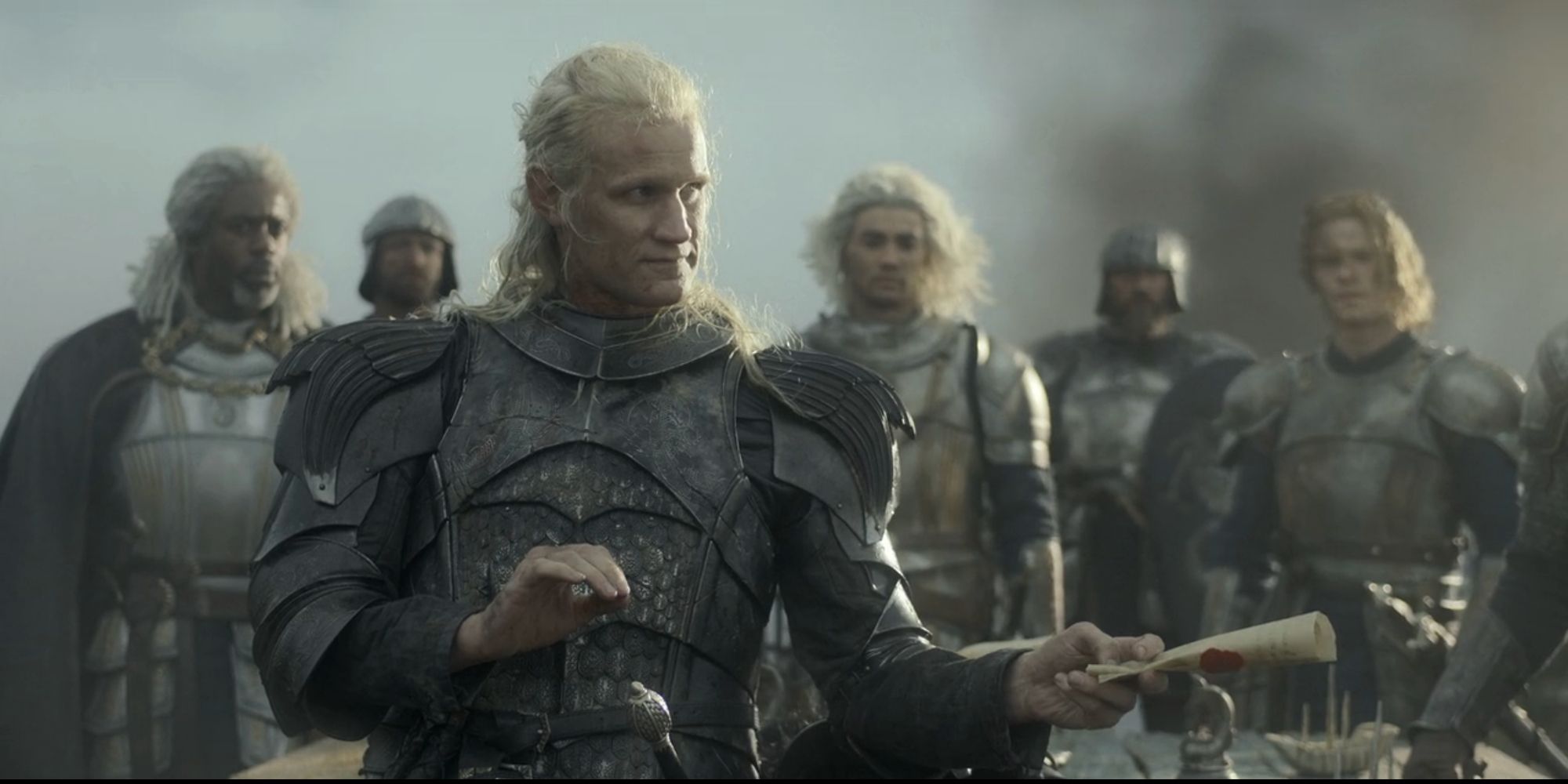 Daemon Targaryen (Matt Smith) receives a message while the war council meets in season 1, episode 3.