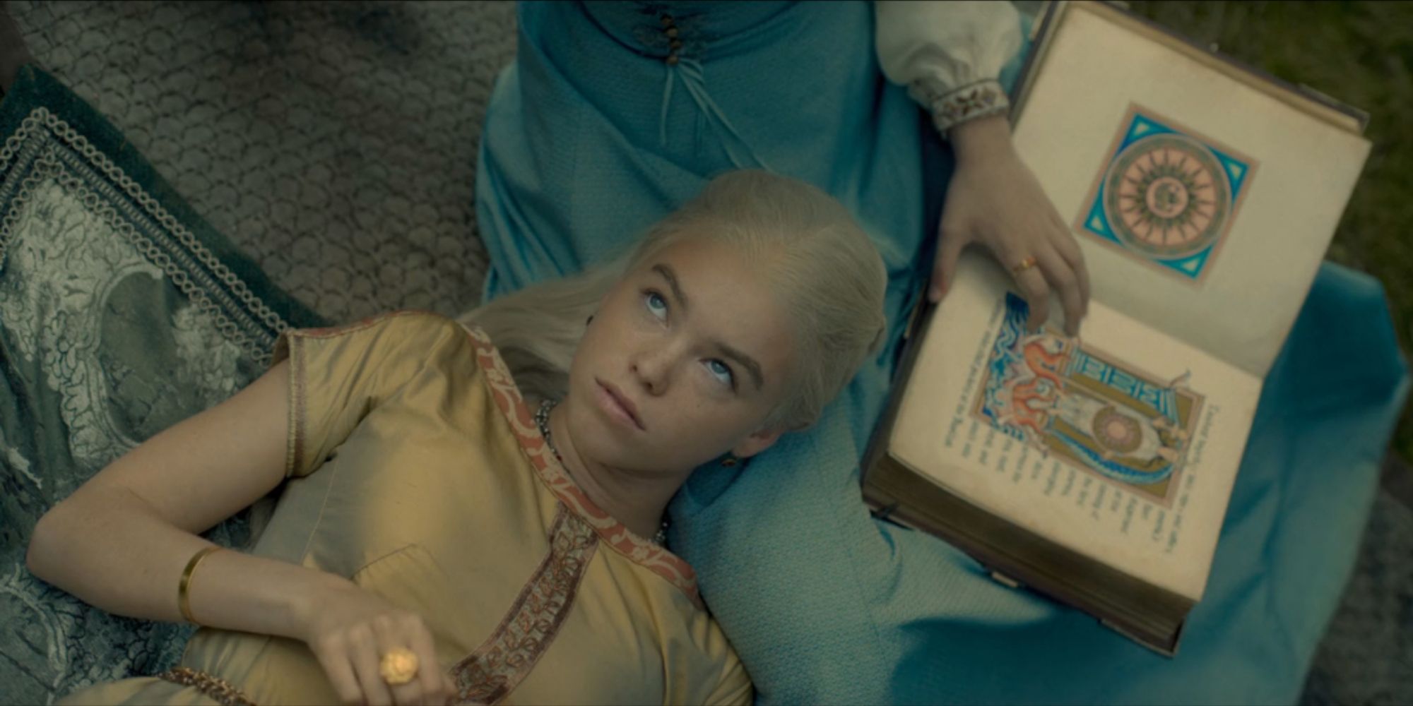 Rhaenyra Targaryen (Milly Alcock) studying with Alicent Hightower (Emily Carey) in season 1, episode 1.