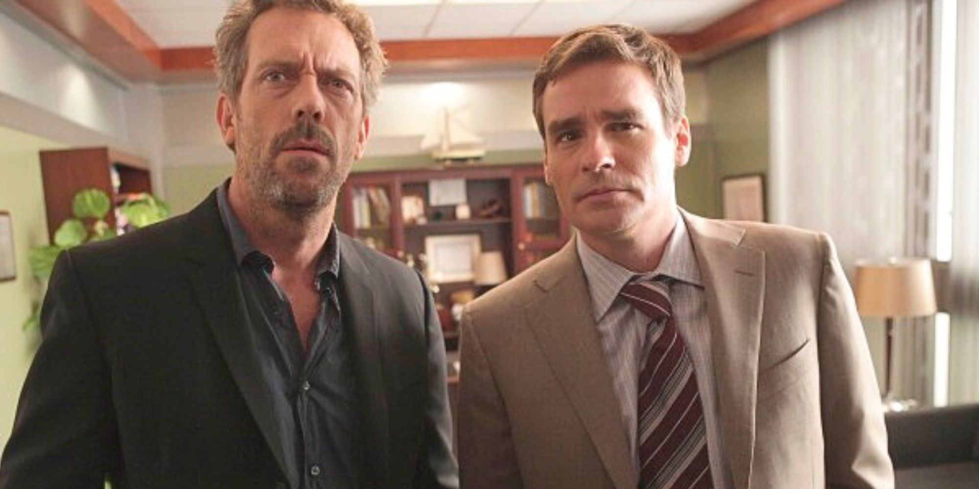 Hugh Laurie standing next to Robert Sean Leonard in House