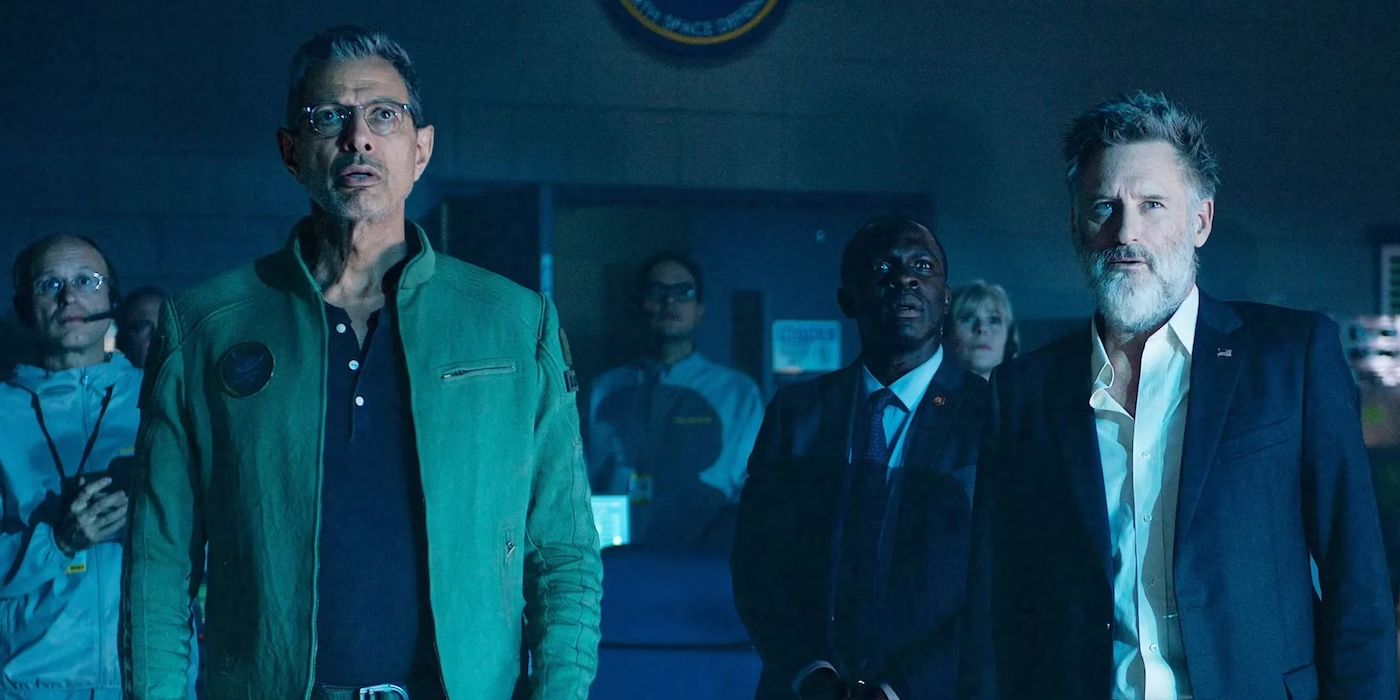 A group government employees looking out with shock and disarray on their faces in 'Independence Day: Resurgence'