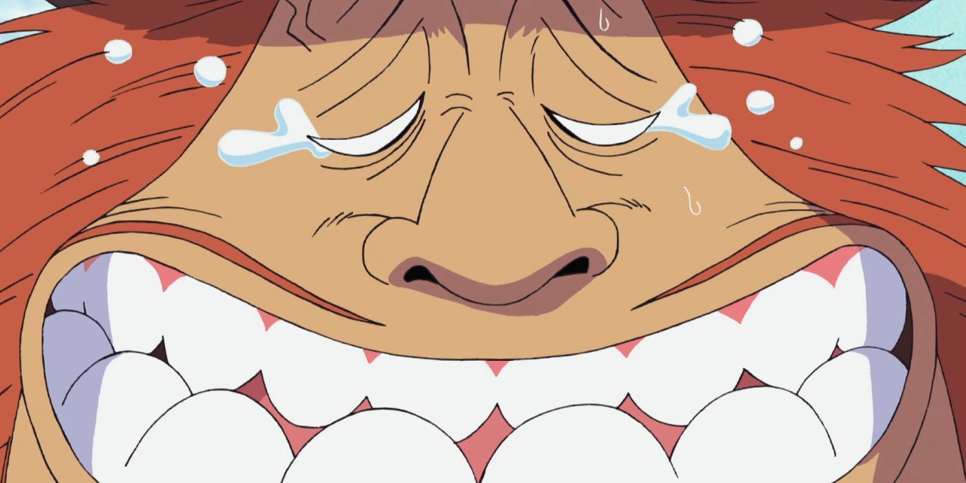 Jaguar D. Saul sonríe con lágrimas en los ojos en One Piece.