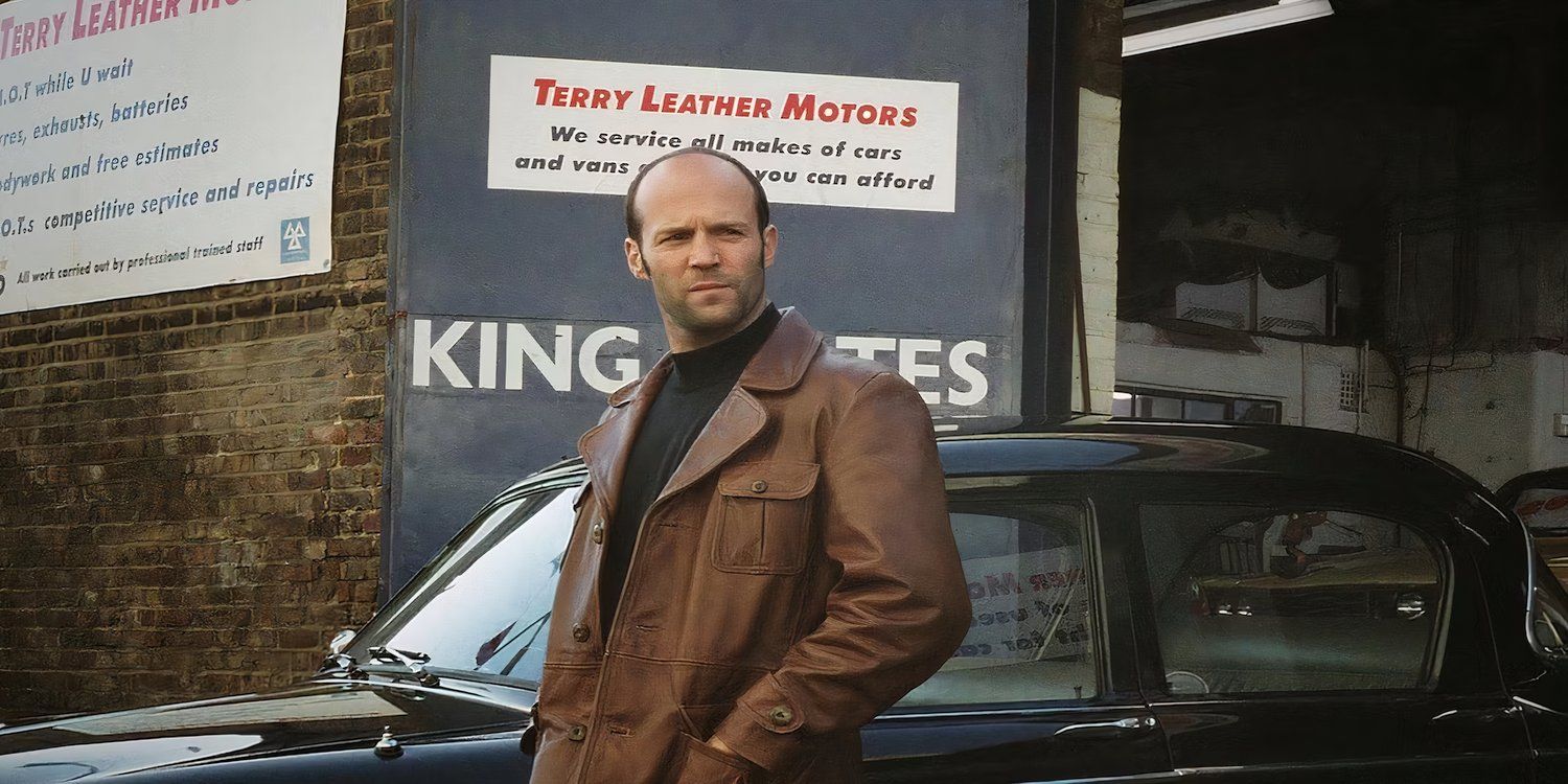 Terry Leather leaning against a car in The Bank Job