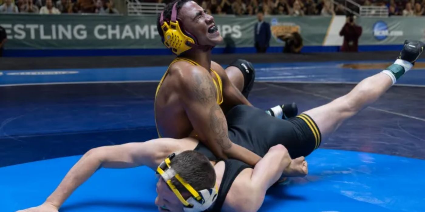 Jharrel Jerome wrestling another guy in a scene from 'Unstoppable'.