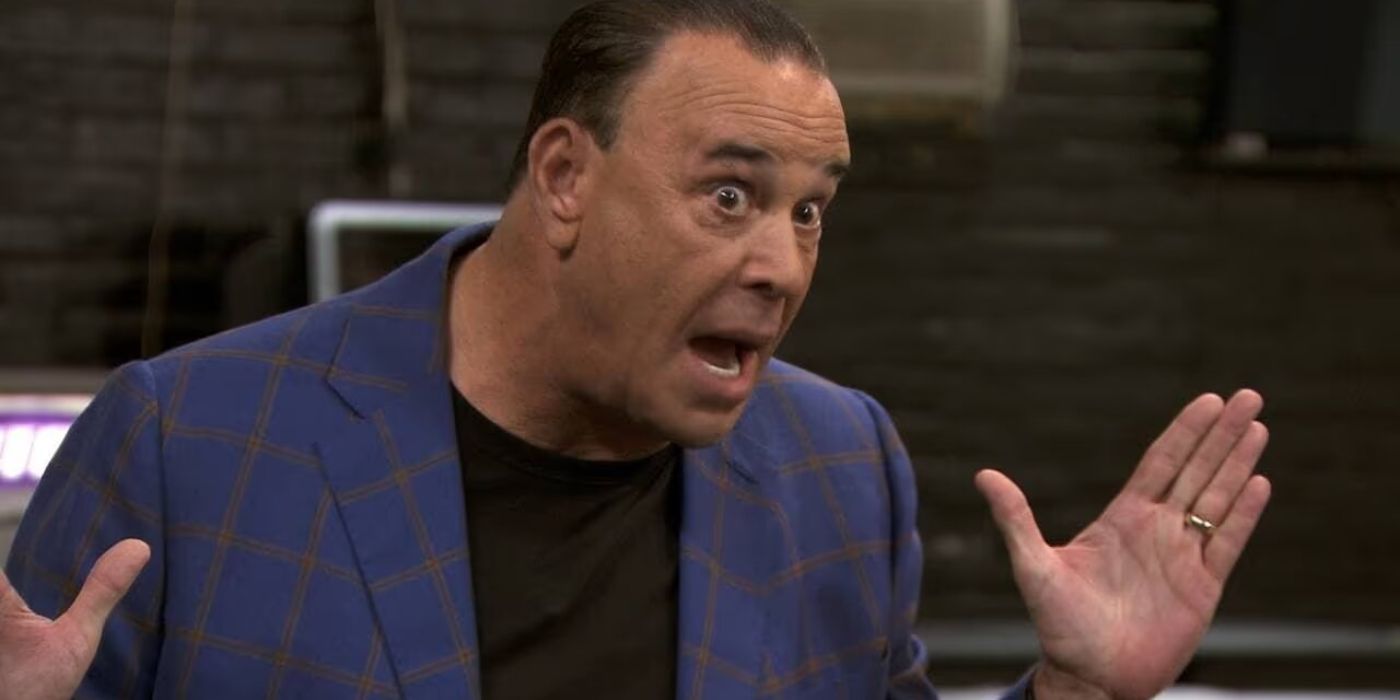 Jon Taffer yelling at someone with his hands in the air on Bar Rescue