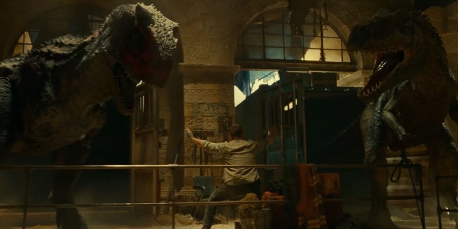 Owen Grady, played by Chris Pratt, tries to stop two carnivores with his hands in &lsquo;Jurassic World Dominion&rsquo;.