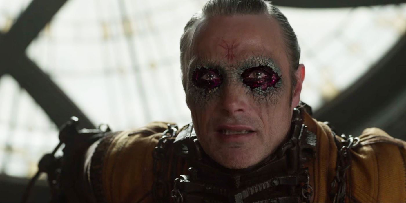 Close-up of Kaecilius crying with purple cracked eyes in Doctor Strange