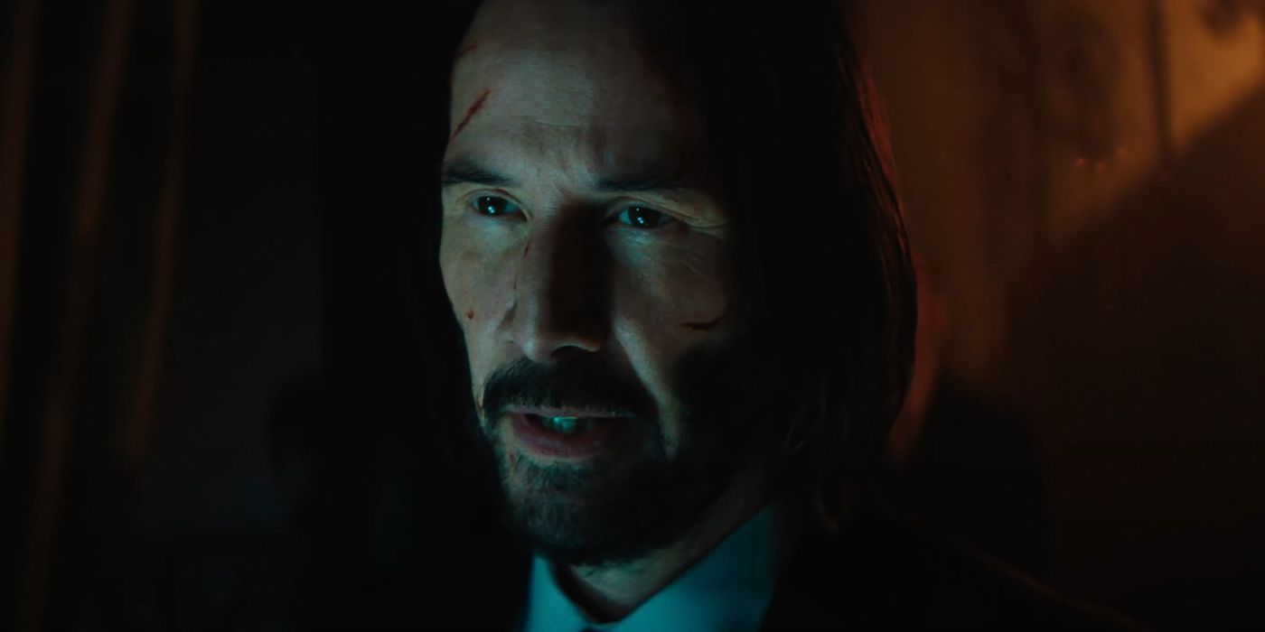 Keanu Reeves as John Wick  with cuts on his face in Ballerina.