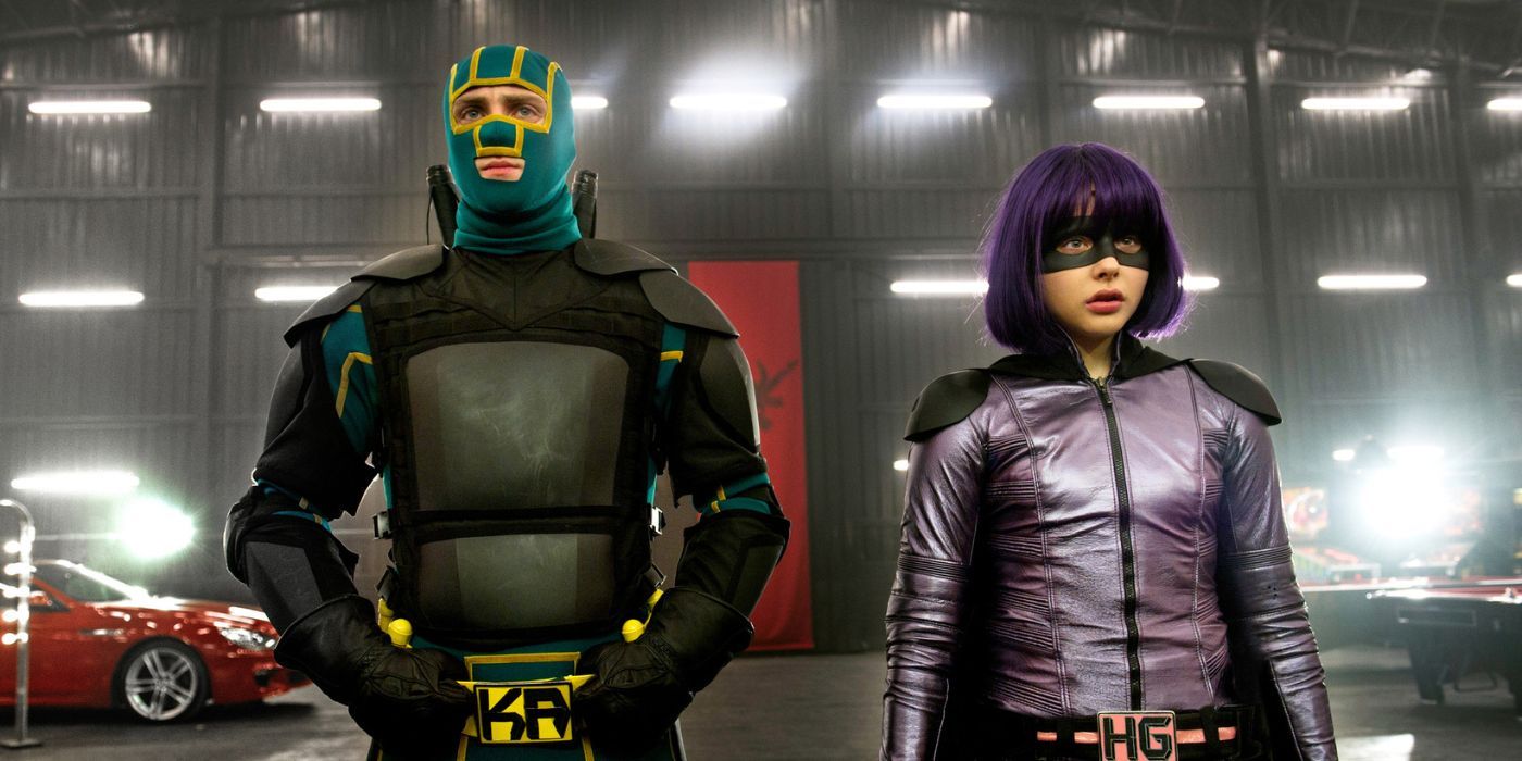 Kick-Ass and Hit-Girl standing in tactical gear in Kick-Ass 2