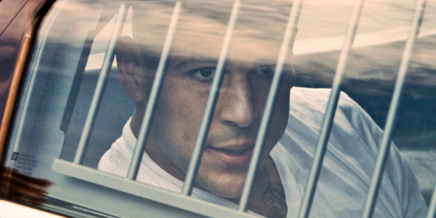 Aaron Hernandez in a police vehicle in Killer Inside Episode 1