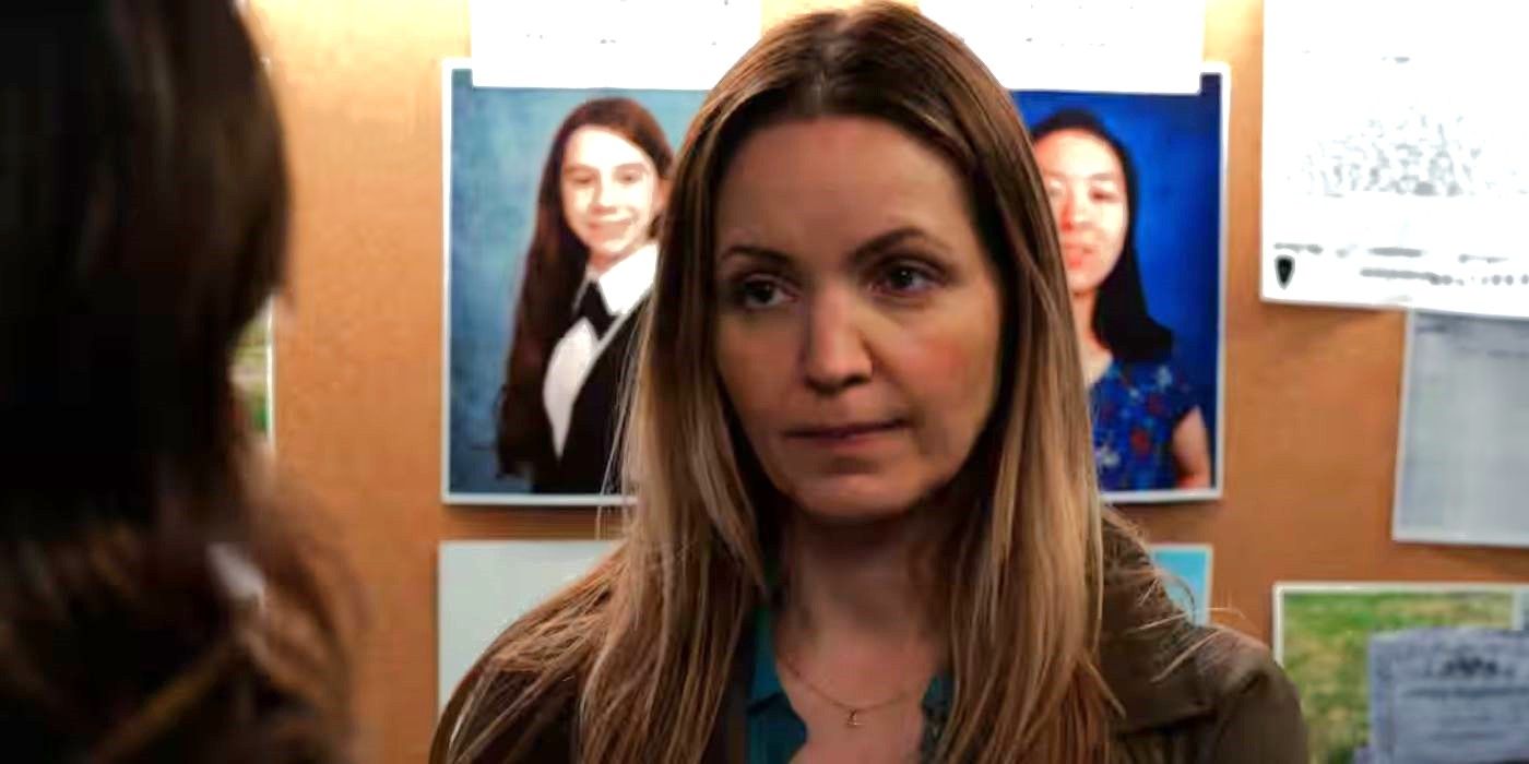 Jordana Spiro as Special Agent Shannah Sykes in front of a board with photos in Law &amp; Order: SVU.