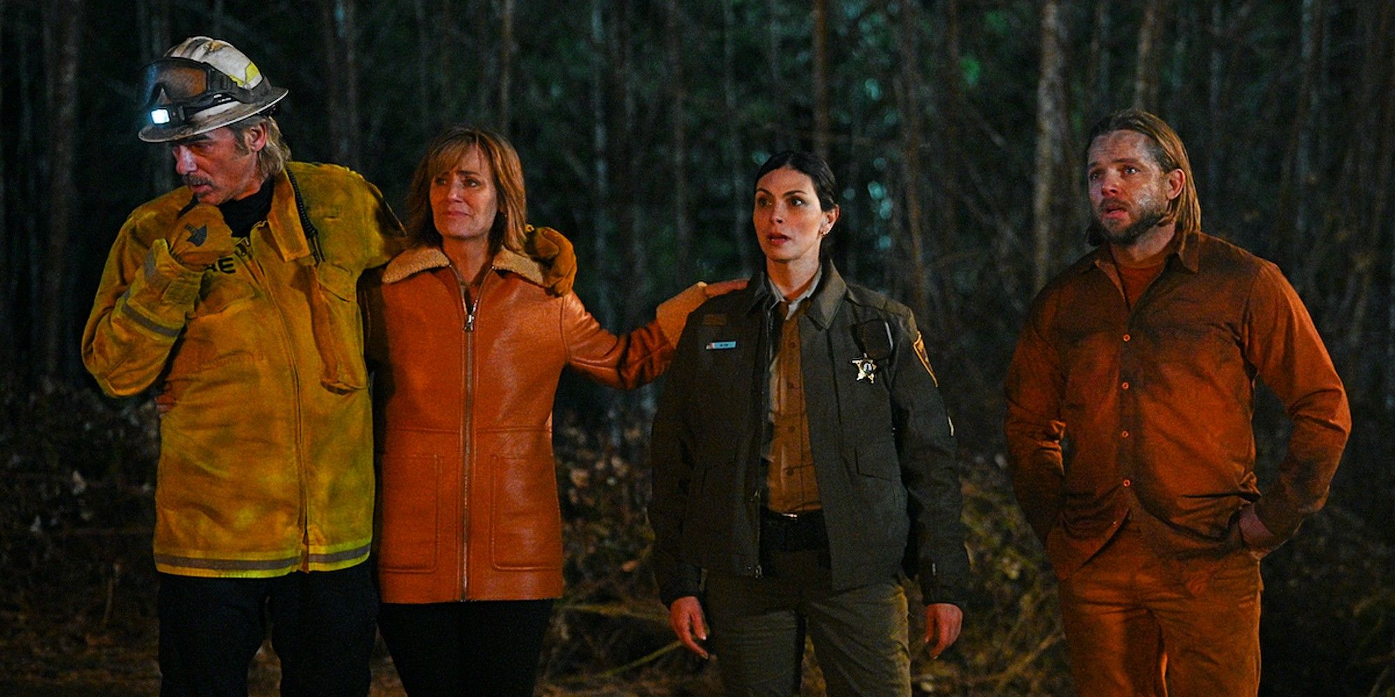 Vince, Sharon, Mickey, and Bode standing together during an emergency in 'Fire Country' Season 2.