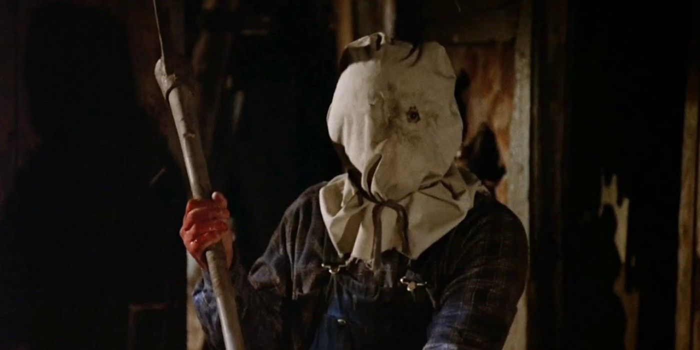 Jason Voorhees raises an ax in 'Friday the 13th Part 2'