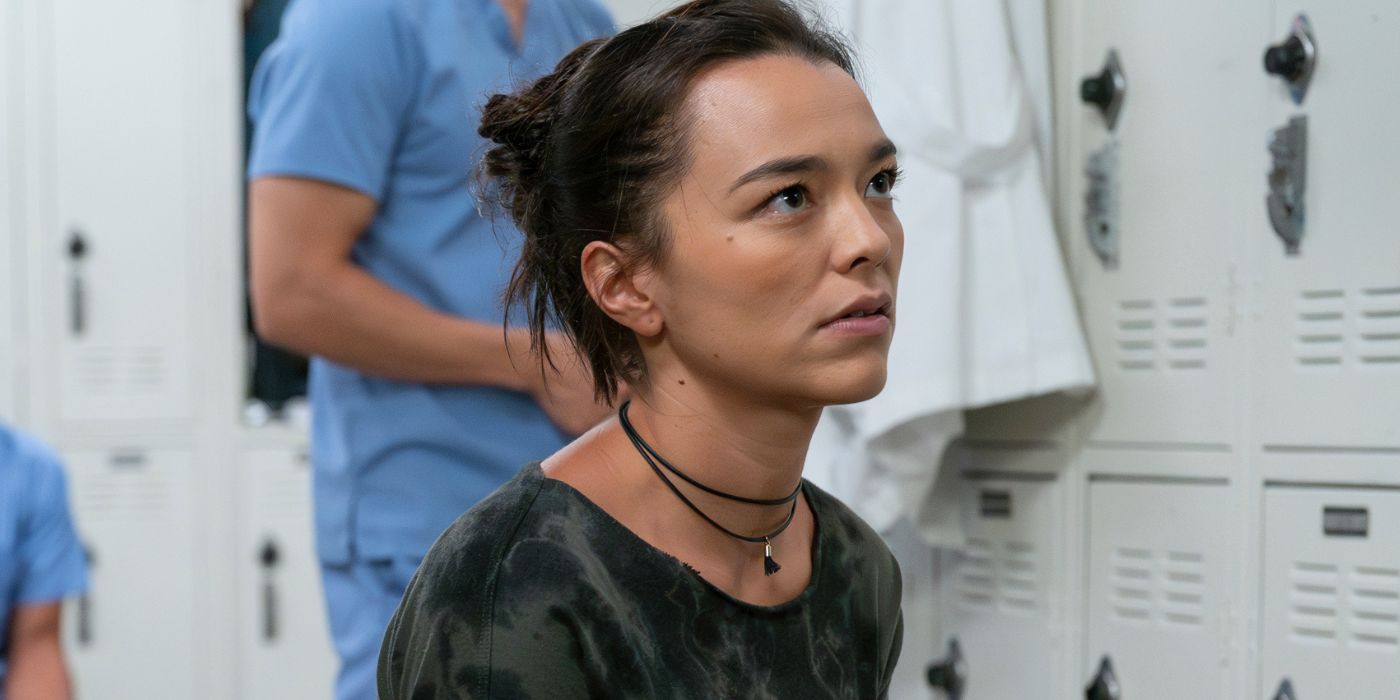 Dr. Mika Yasuda (Midori Francis) sits in the locker room in Grey's Anatomy Season 21