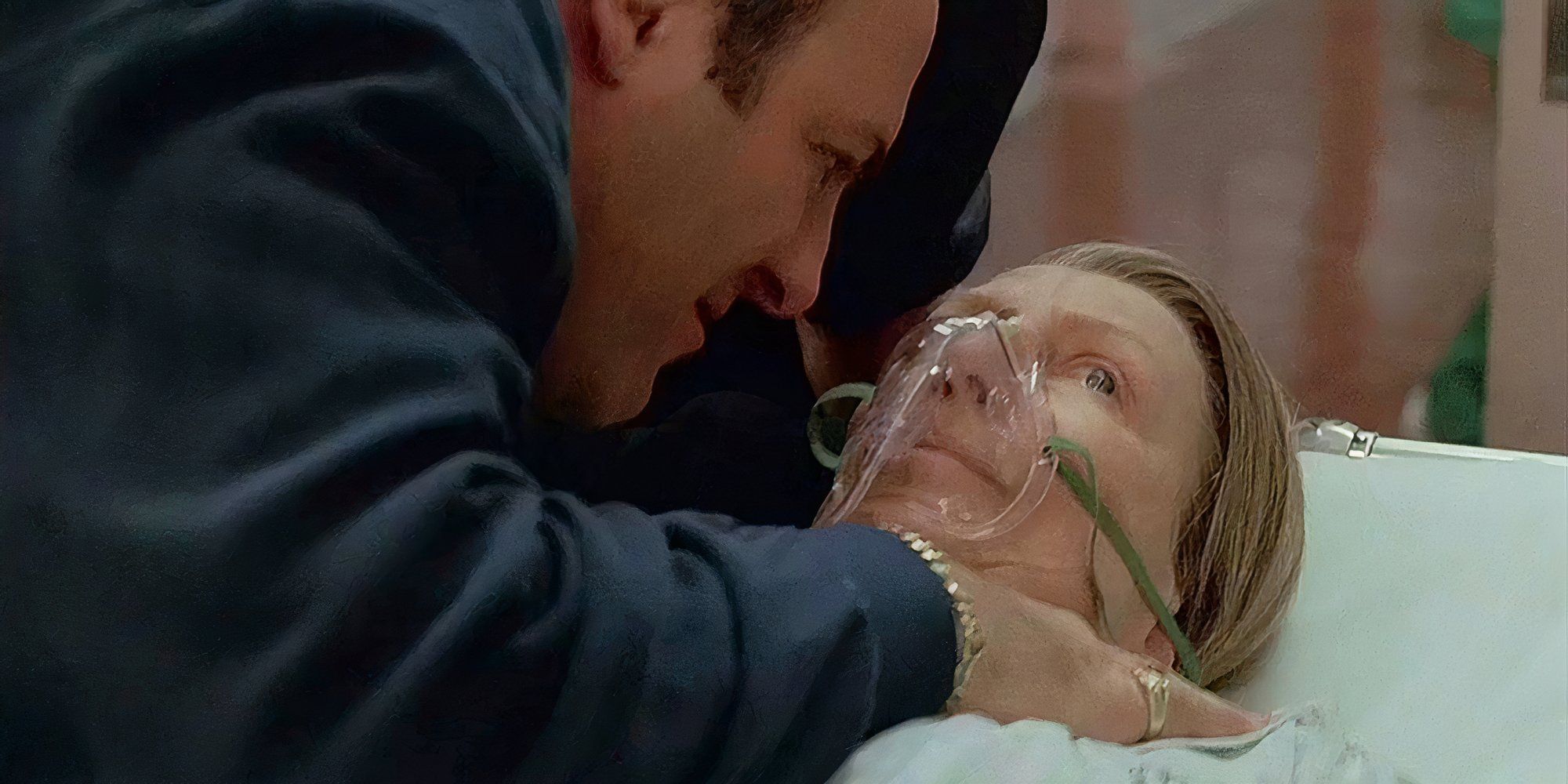 James Gandolfini bending down to Nancy Marchand's who is lying on a hospital gurney in The Sopranos.