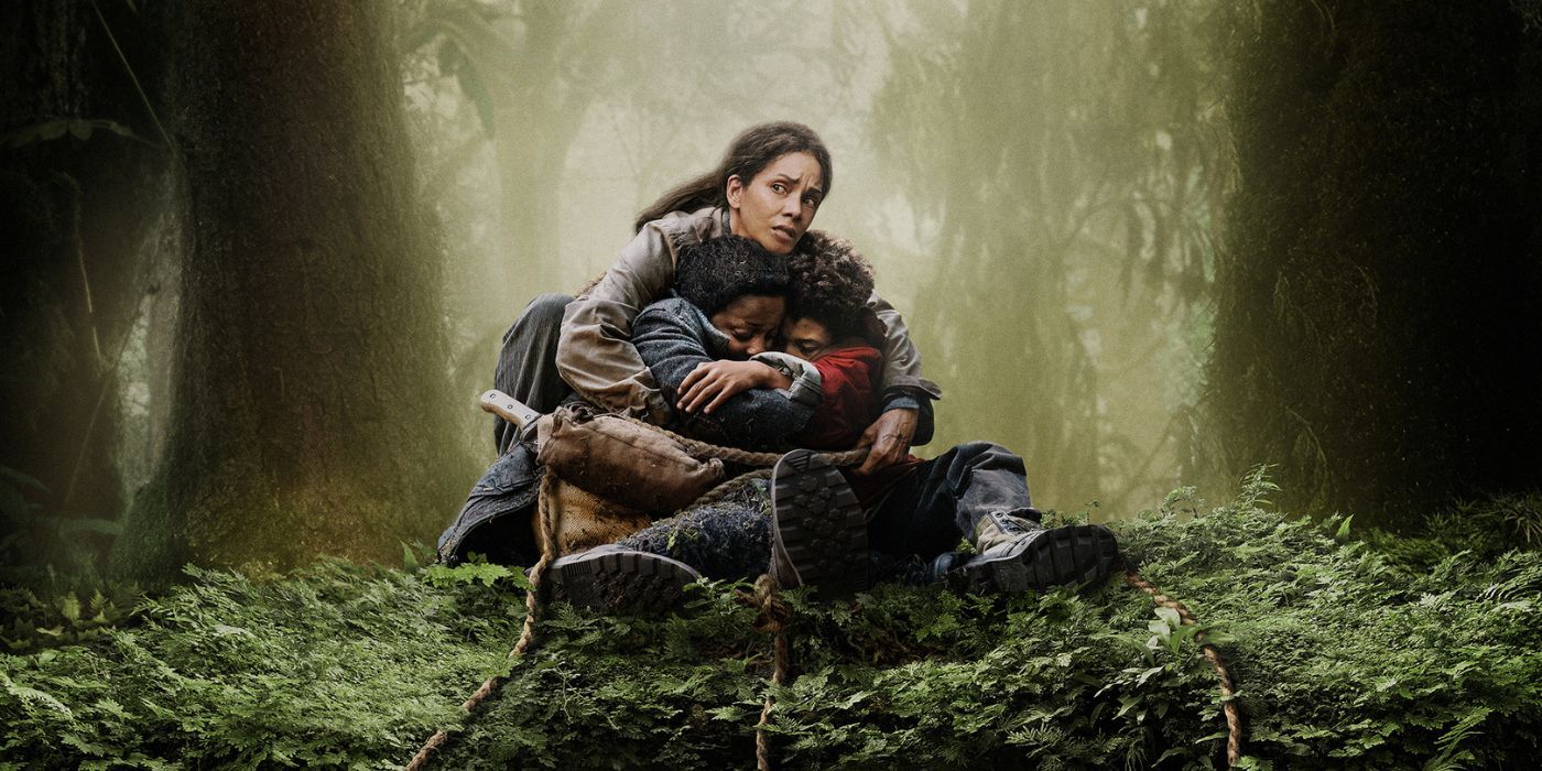 Halle Berry clutching her two boys in the woods on the poster for Never Let Go.