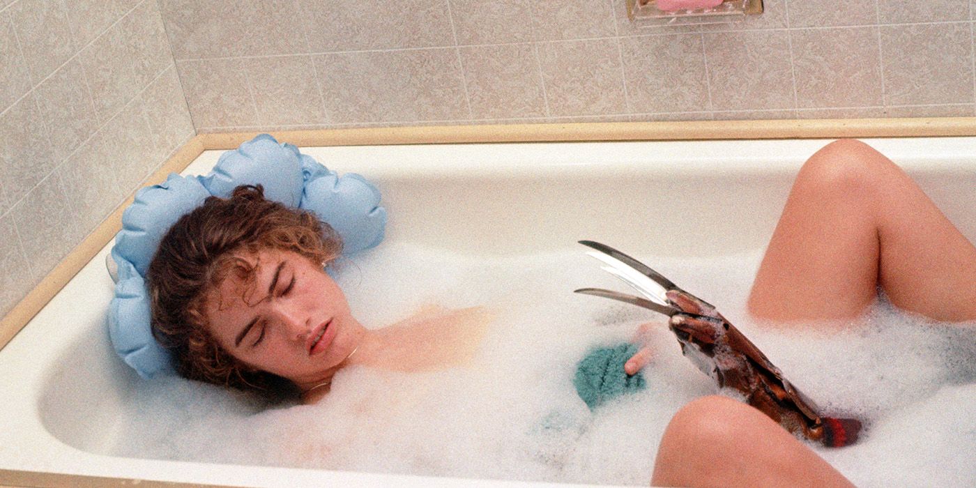Heather Langenkamp as Nancy, asleep in the bathtub in A Nightmare on Elm Street.