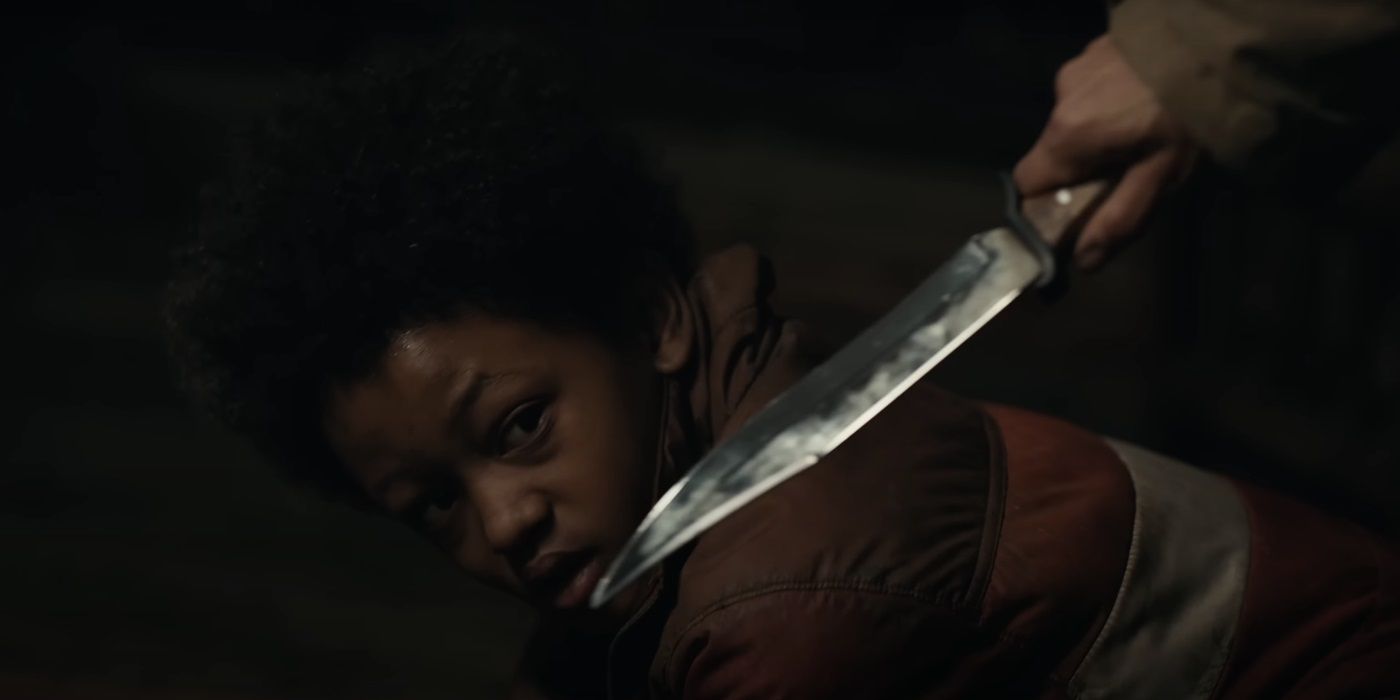 Percy Daggs IV, getting threatened with a knife, in Never Let Go