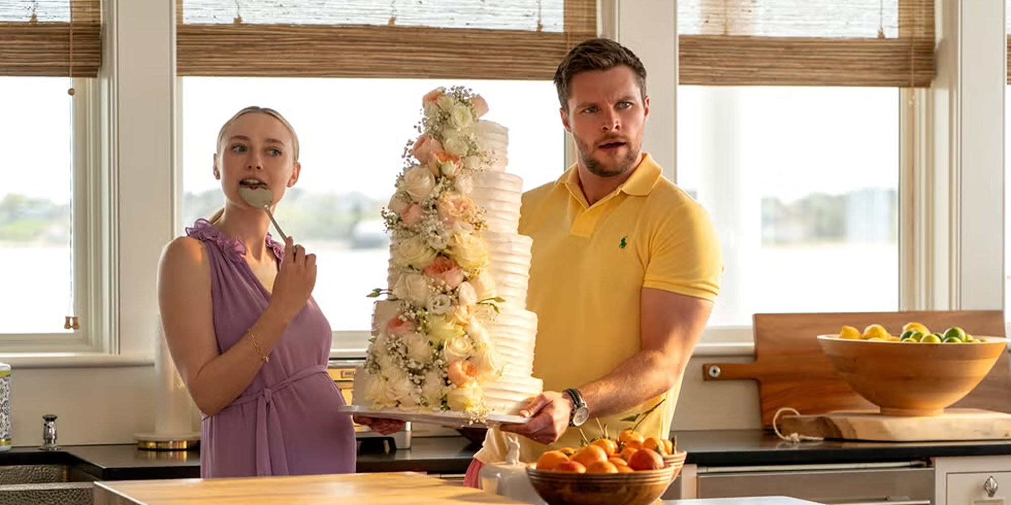 Dakota Fanning licking a spoon and Jack Reynor holding a wedding cake in The Perfect Couple