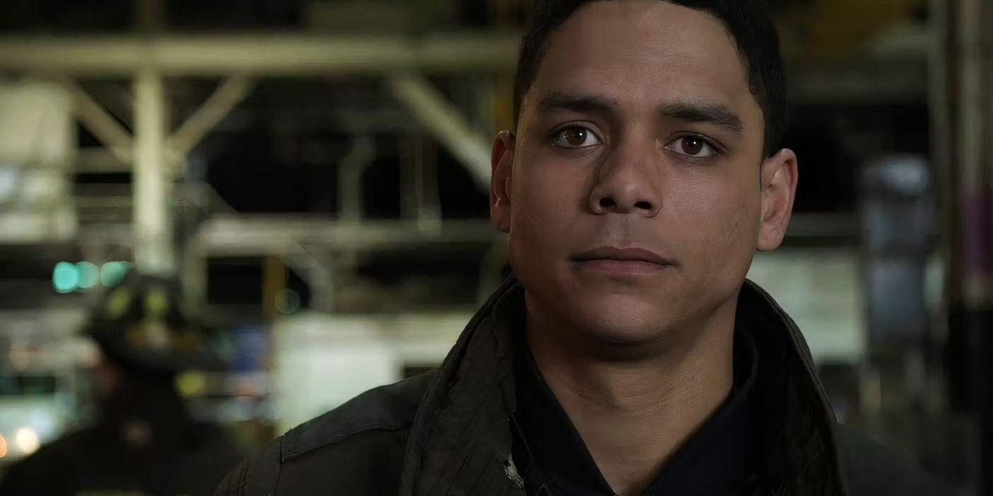 Charlie Barnett as Peter Mills stares slightly off camera and wears a thick jacket in Chicago Fire.