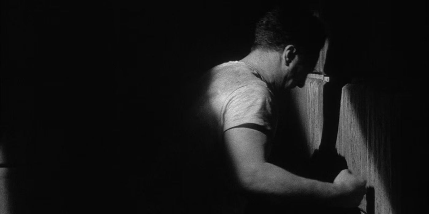 Locked in a cell, Jake LaMotta (Robert De Niro) punches the wall in &lsquo;Raging Bull&rsquo; (1980).