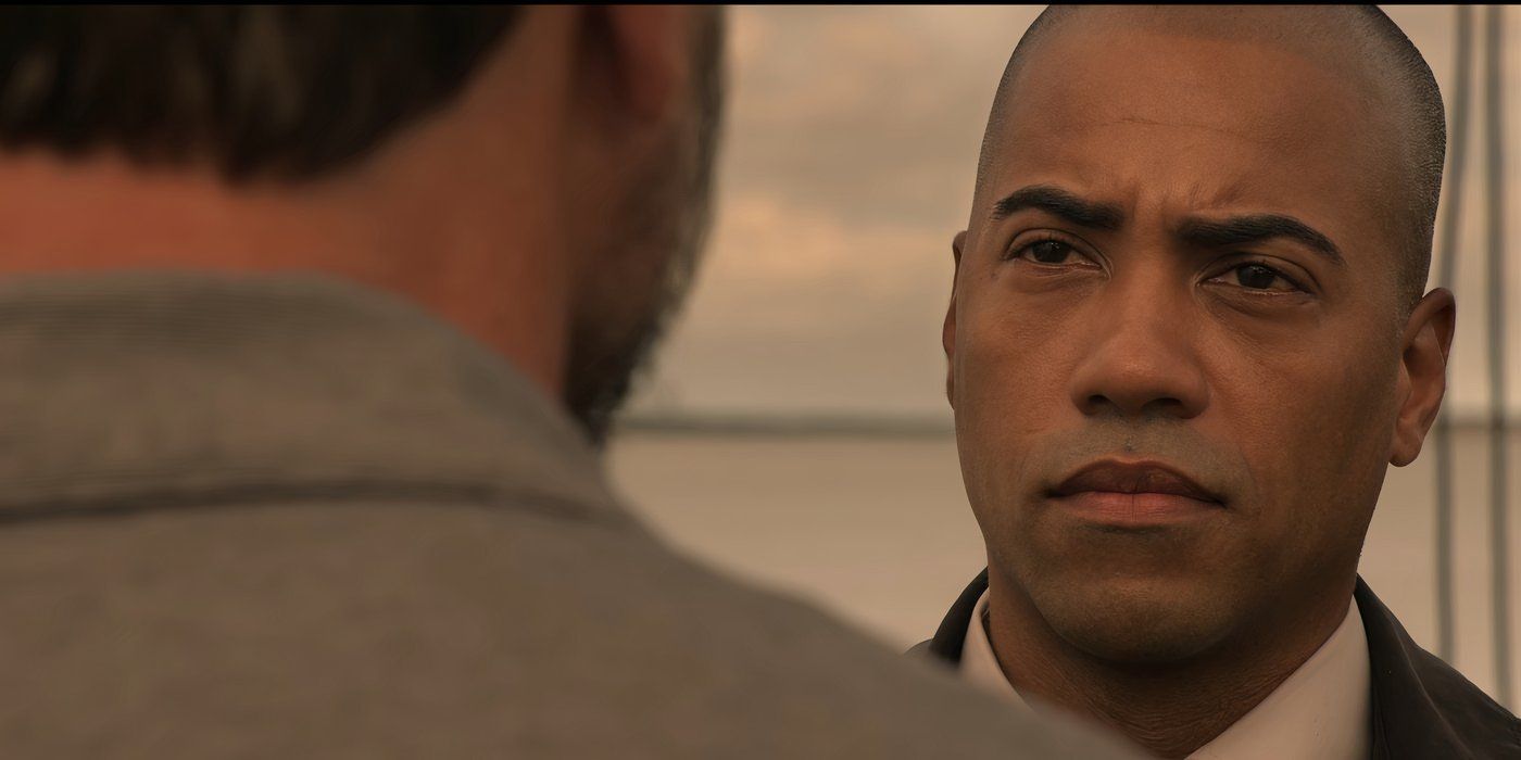 Brad James as SBI Agent Bratcher speaks to Charles Esten as Ward Cameron in Outer Banks.