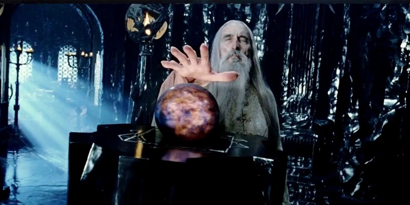 Saruman (Christopher Lee) reaching for the palantir in The Two Towers