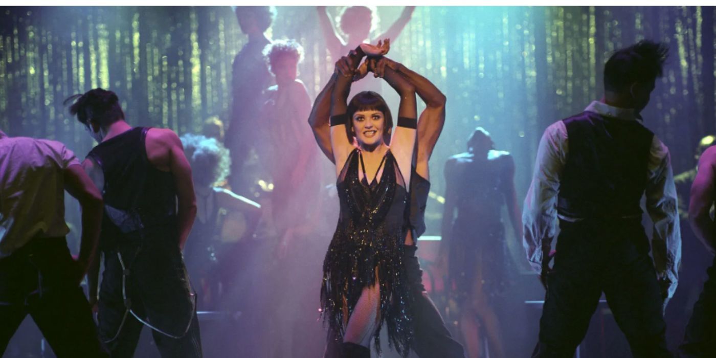 Catherine Zeta Jones as Velma Kelly wearing a black dress performing on stage in &lsquo;Chicago&rsquo;