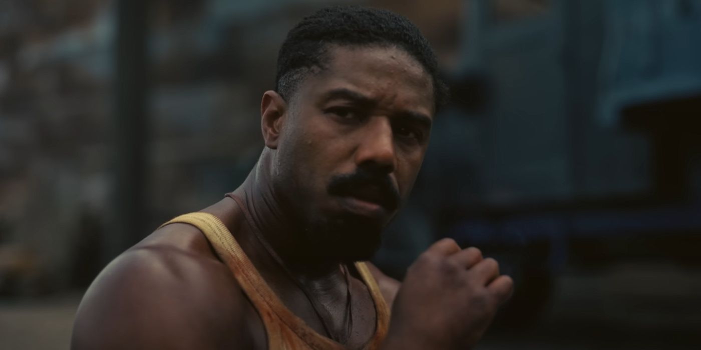 Michael B Jordan in a bloodied tanktop in Sinners.