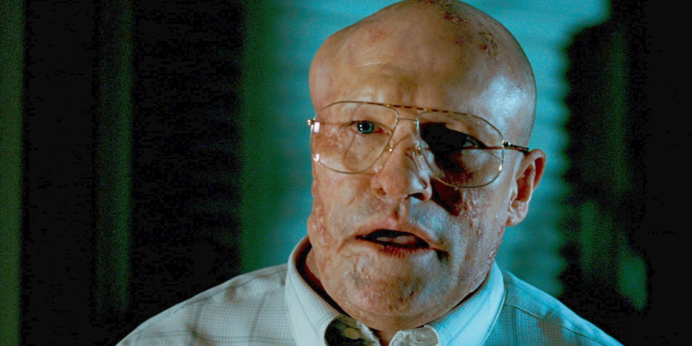 A close up of Grant Grant (Michael Rooker) as his face develops sores and boils in Slither