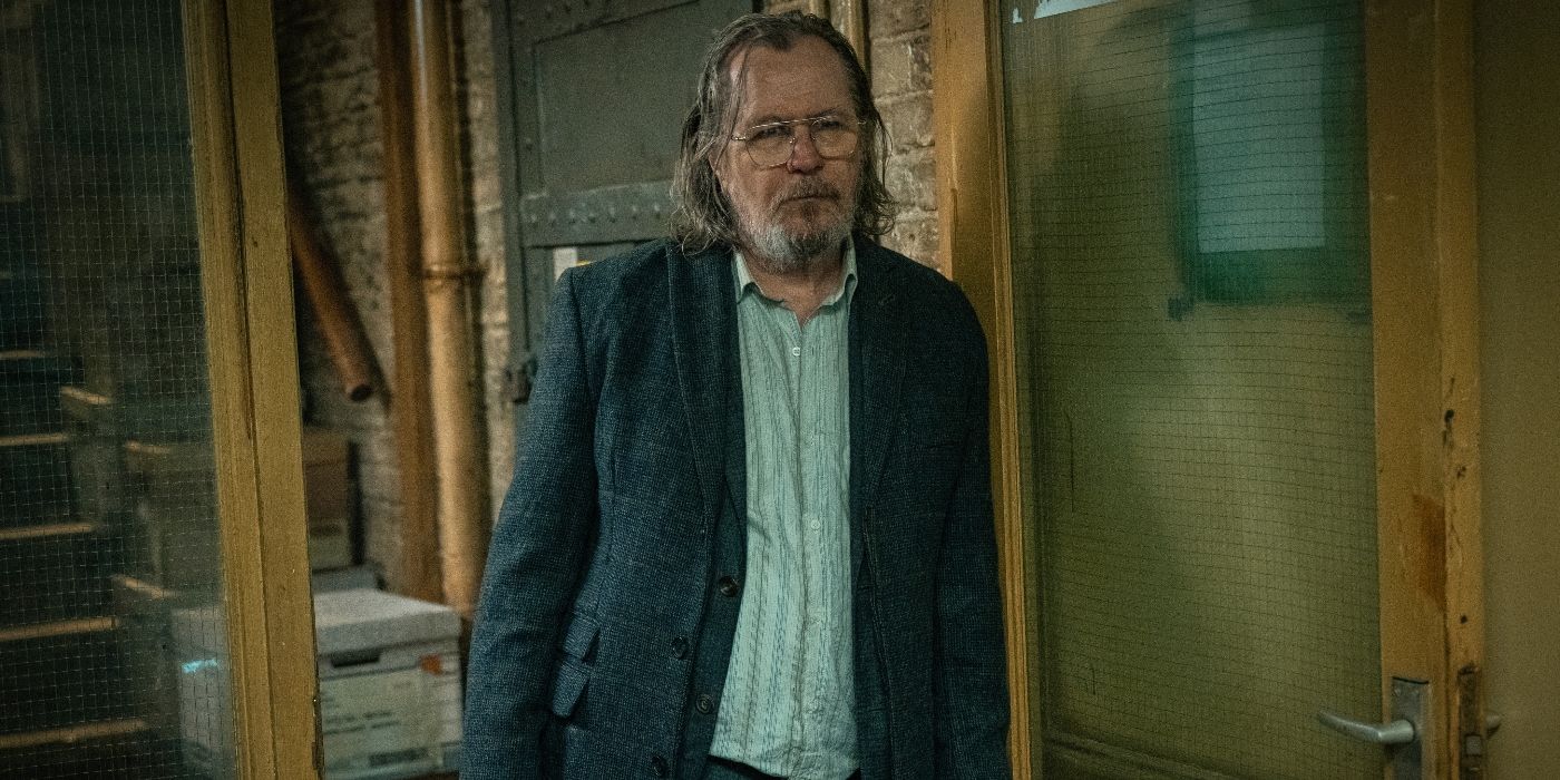 Gary Oldman leans against a door frame in Slow Horses Season 4 Episode 2.