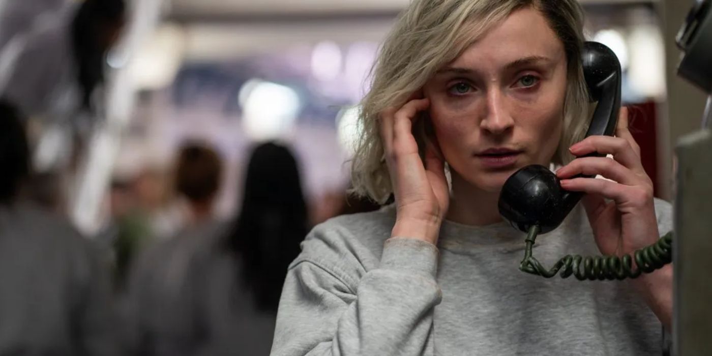 Sophie Turner with a bare face, talking to someone on the phone in &lsquo;Joan&rsquo; series.