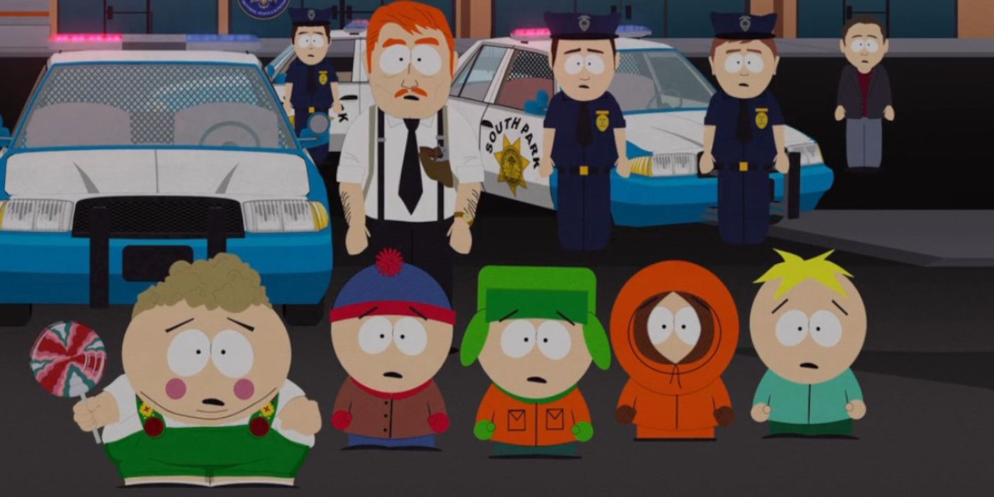 Cartman, Stan, Kyle, Kenny and Butters watch a standoff with a witch in South Park.