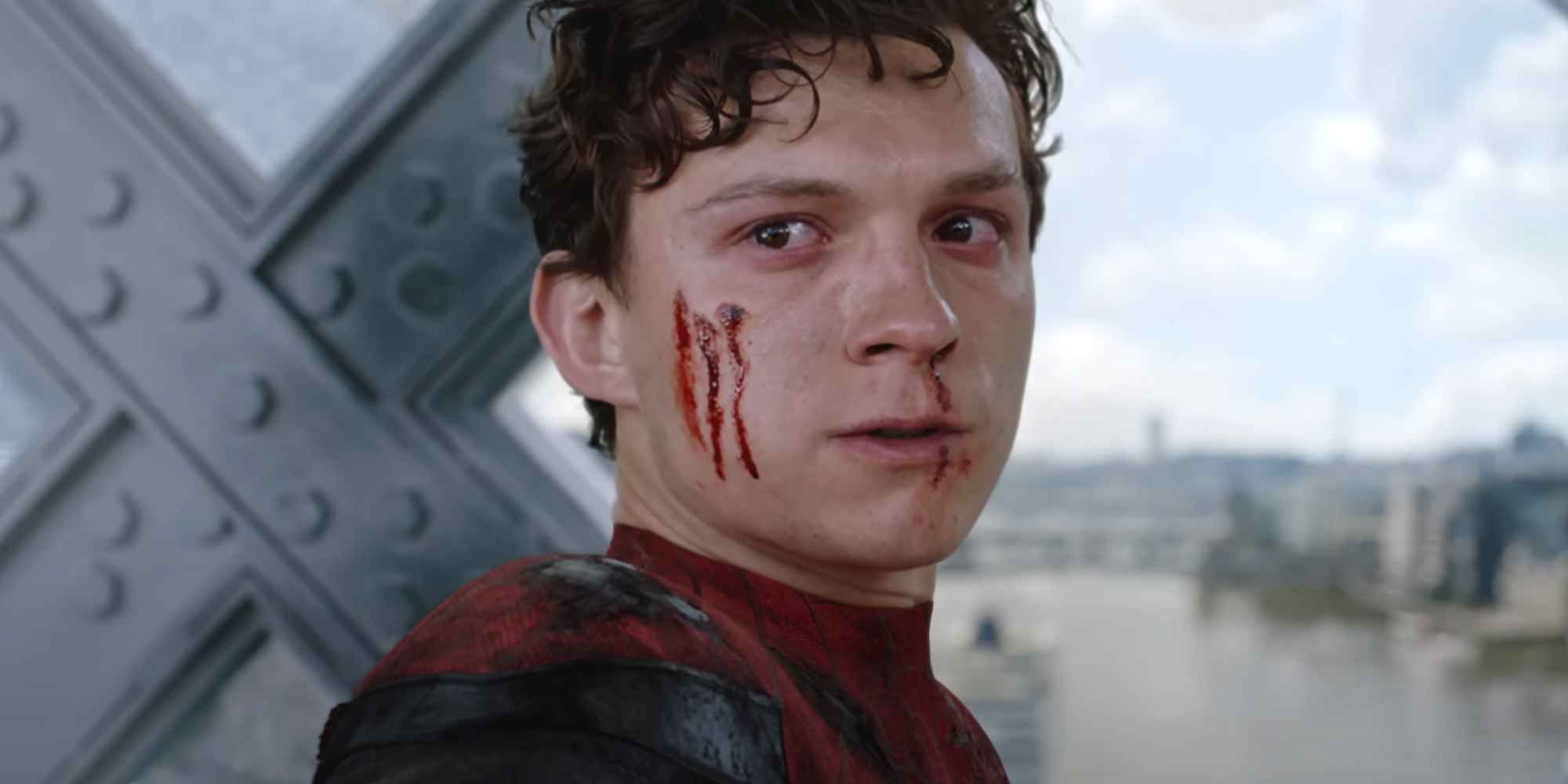 Peter Parker, bloodied from battle, looking to his right in 'Spider-Man: Far From Home'