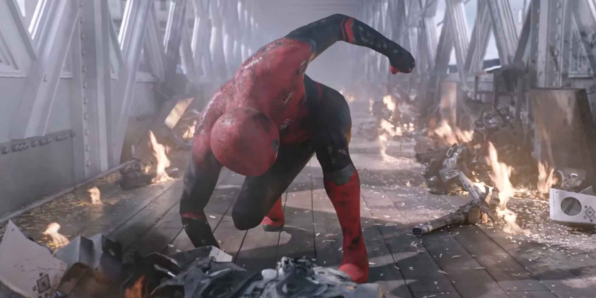 Spider-Man in a hero pose with one fist and knee to the ground in 'Spider-Man: Far From Home'