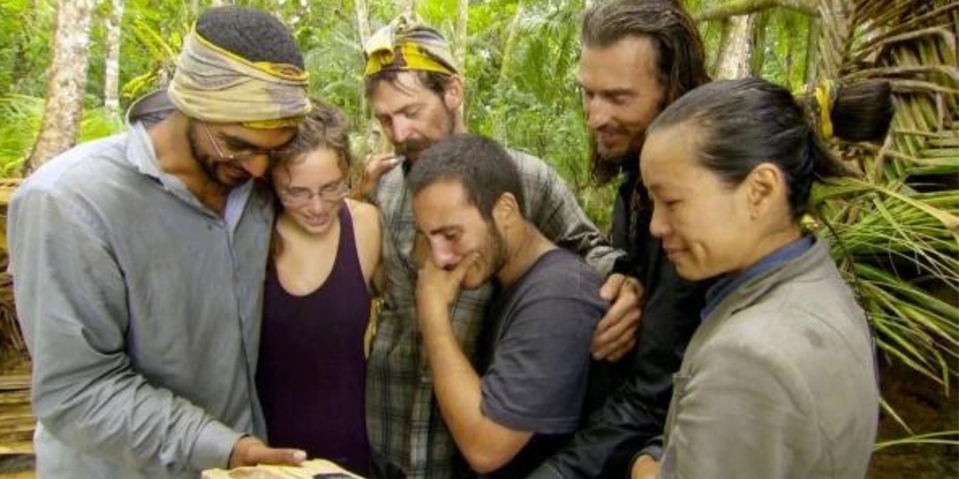 The tribe reads tree mail on &lsquo;Survivor: South Pacific.'