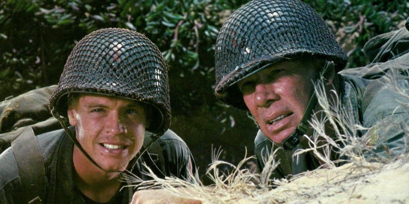 Mark Hamil as Private Griff and Lee Marvin The Sargent peaking out from cover in The Big Red One