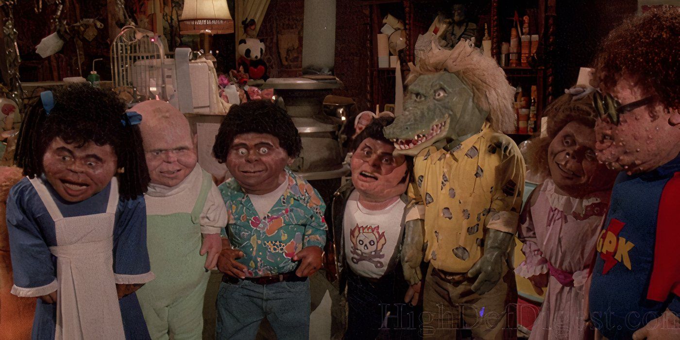 A group of Garbage Pail Kids stand in a semi-circle in The Garbage Pail Kids Movie.