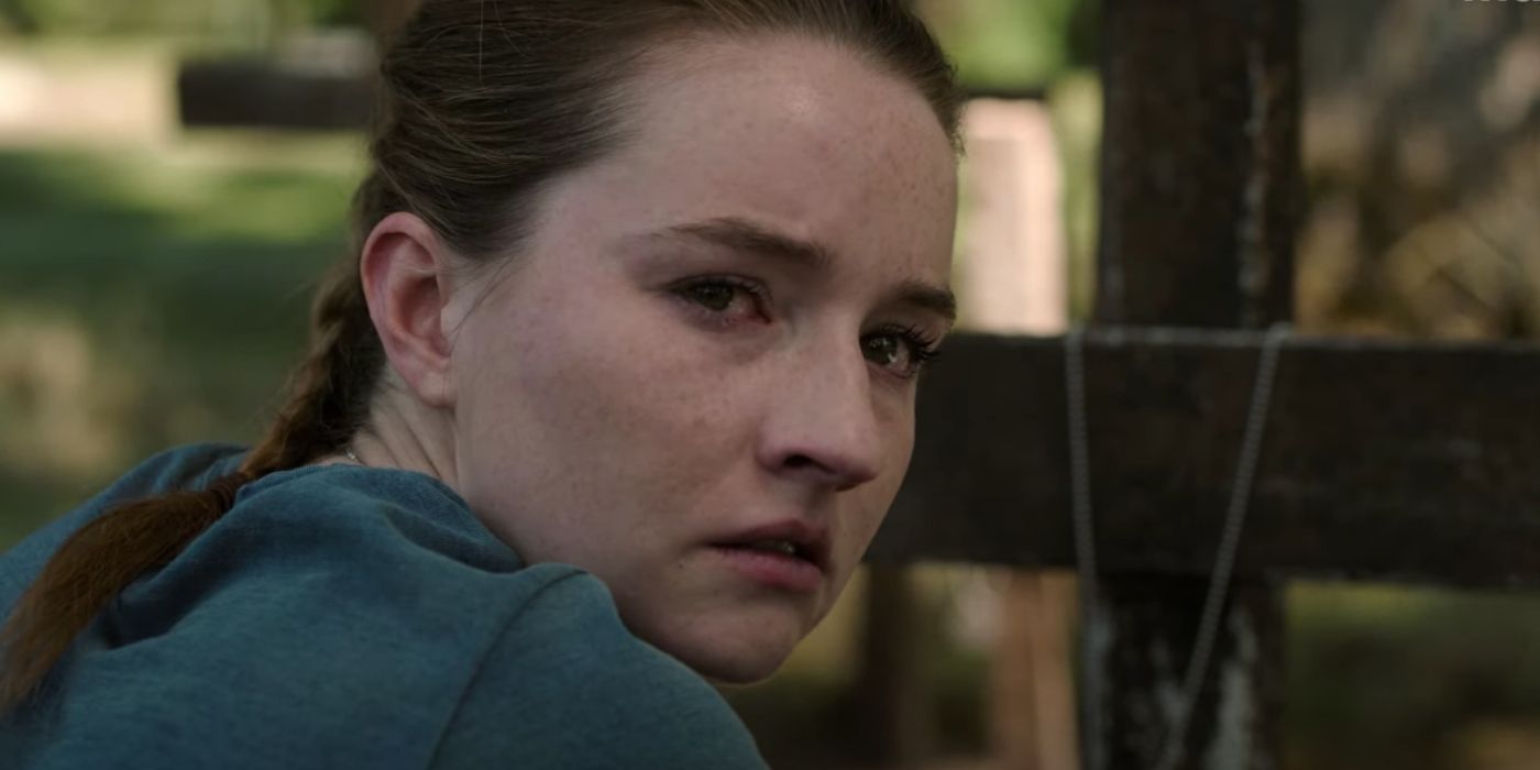 Abby (Kaitlyn Dever) looks over a grave in The Last of Us Season 2