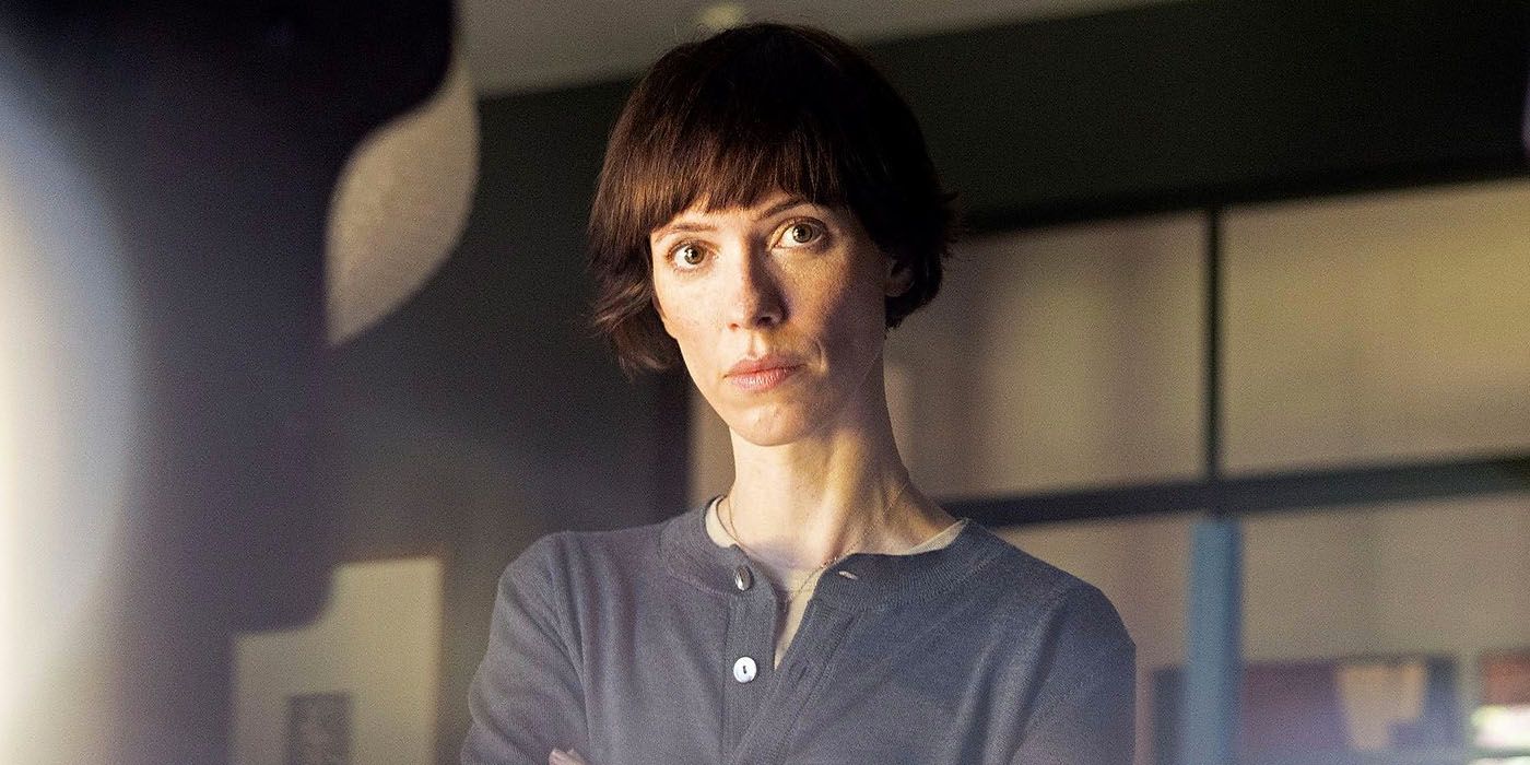 Rebecca Hall is seen stoic in a scene from The Listeners.