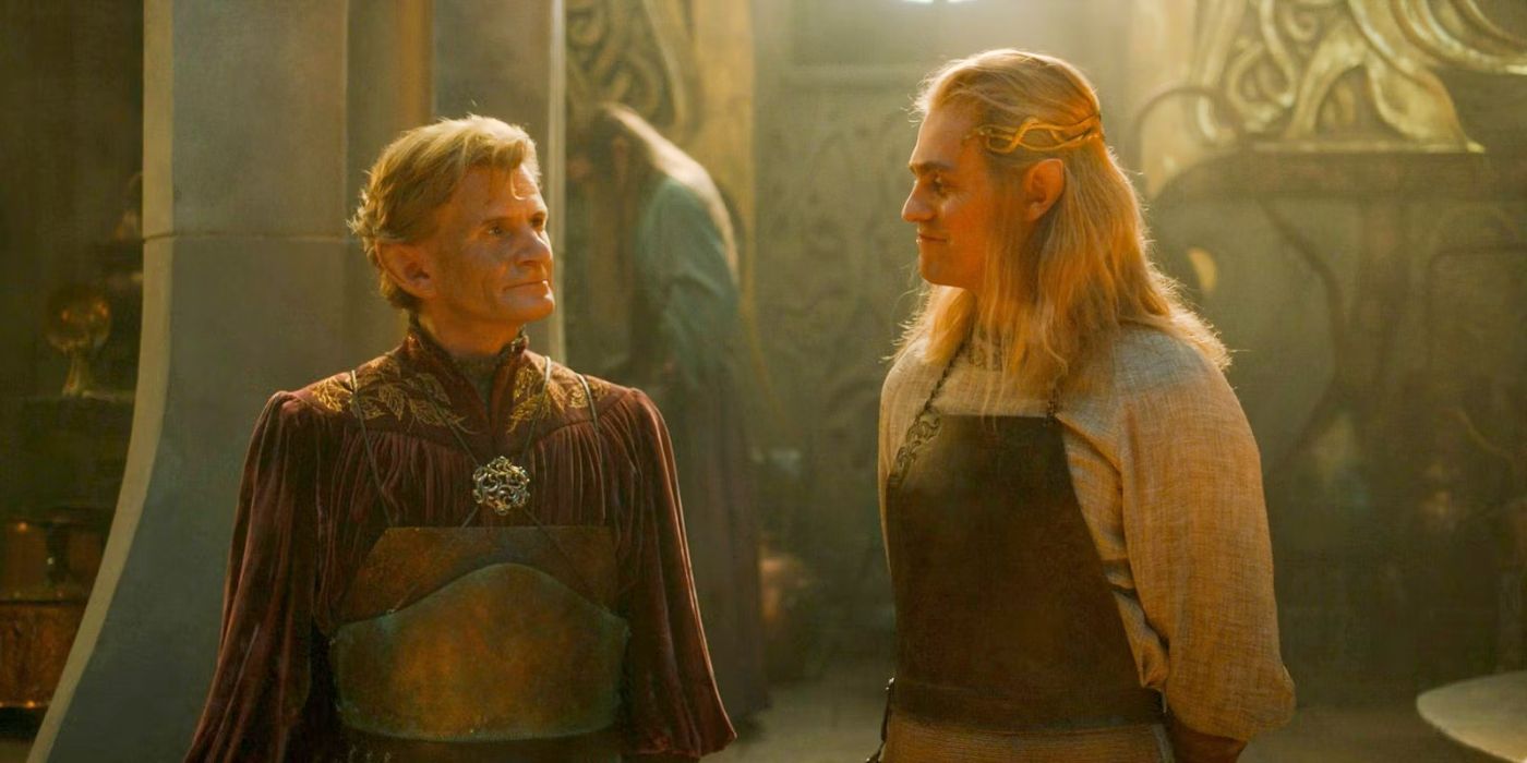 Celebrimbor (Charles Edwards) and Sauron as Annatar (Charlie Vickers) looking at one another and smiling in The Rings of Power Season 2